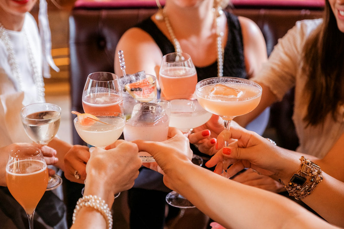 A group of friends raising their glasses for a toast